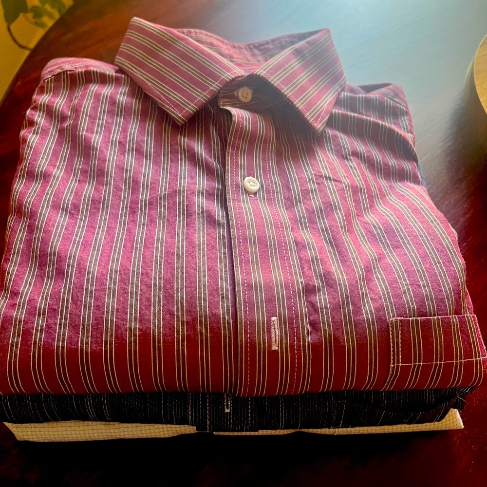 Selling three near new dress casual shirts for 
men. .